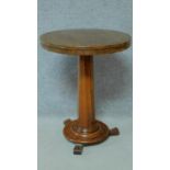 A 19th century mahogany circular occasional table raised on pedestal base. H.74 L.57 W.57cm