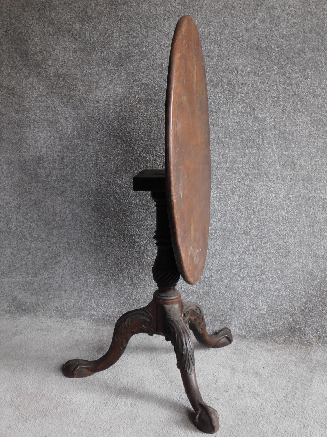 A Georgian mahogany circular tilt top occasional table on well carved tripod cabriole base - Image 4 of 5