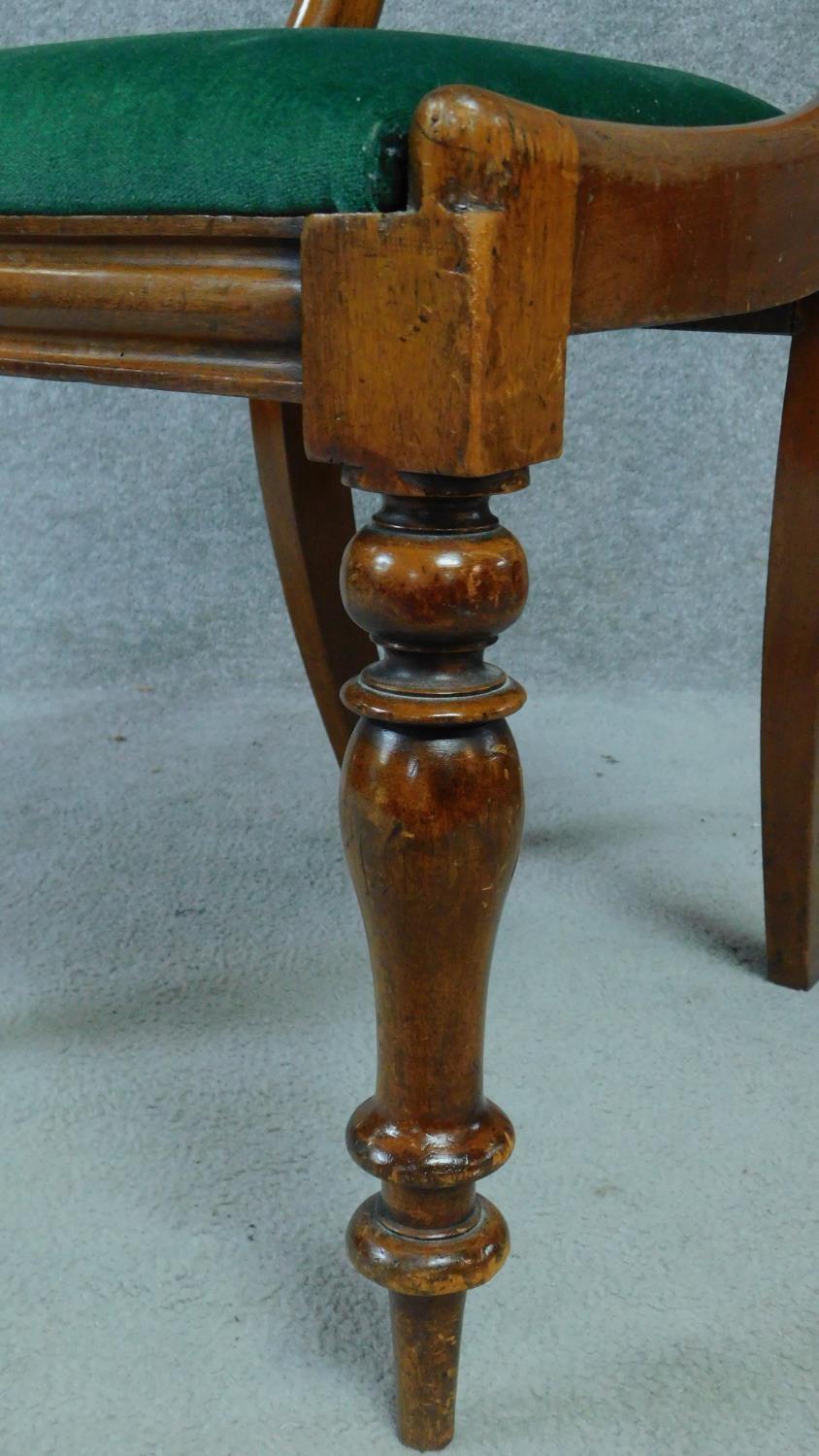 A set of four Victorian mahogany balloon back dining chairs on turned tapering supports. H.87cm - Image 3 of 4