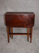 An Edwardian mahogany drop leaf Sutherland table. H.62 x 53cm (ext. 66cm)