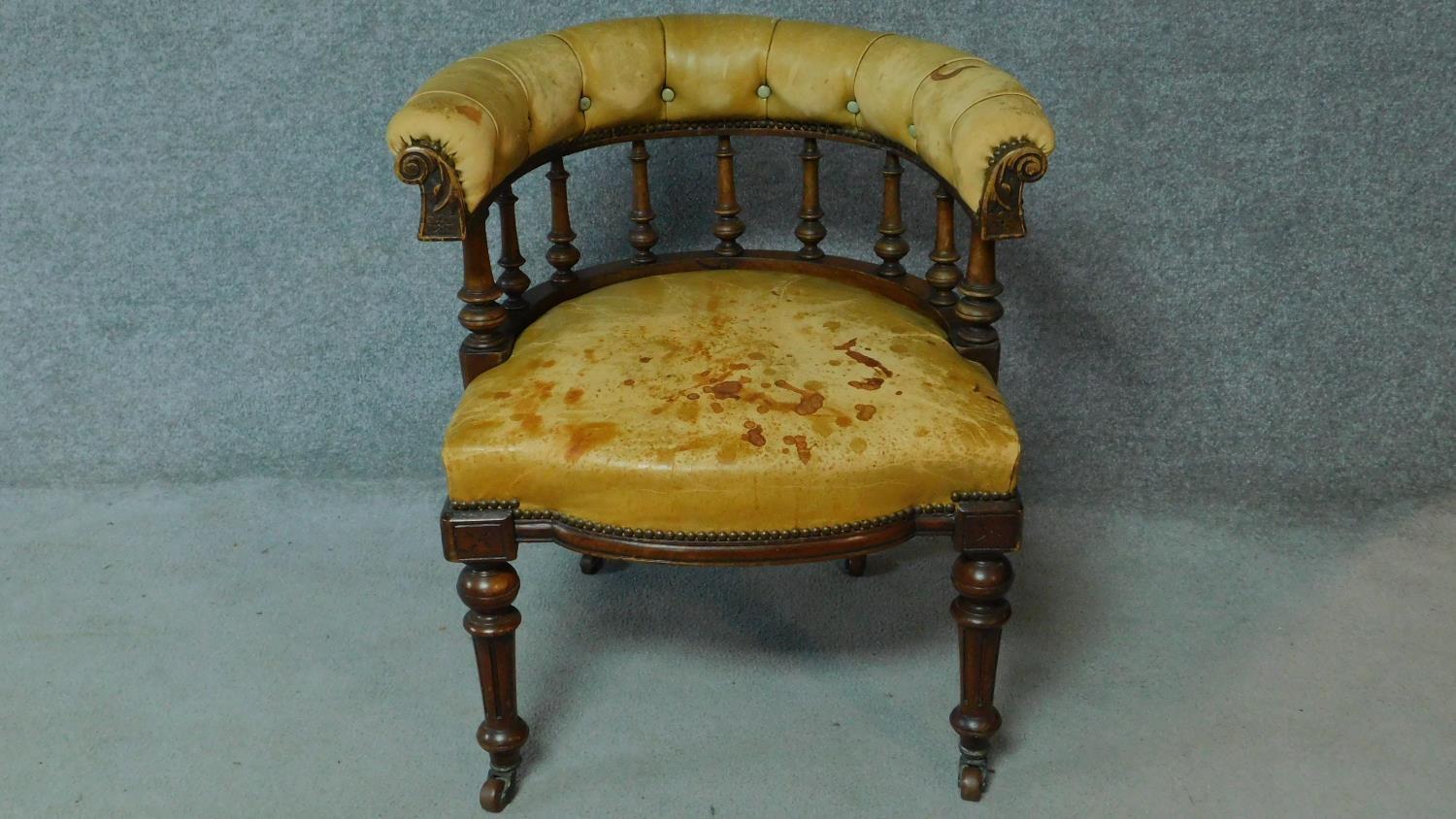 A late 19th century mahogany framed leather upholstered buttoned back library tub armchair on turned - Image 2 of 6