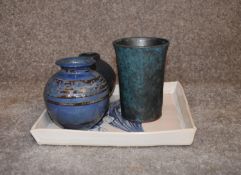 Three art pottery vases and an art pottery platter with blue glazed floral decoration. Tallest H. cm