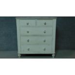 A 19th century distressed painted white chest of two short over three long drawers. H.104 W.100 D.