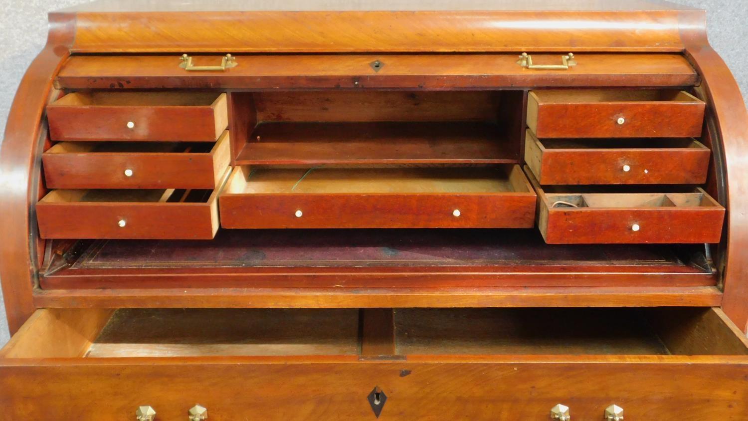 A 19th century continental mahogany cylinder top bureau with tooled leather lined slide out - Image 3 of 7