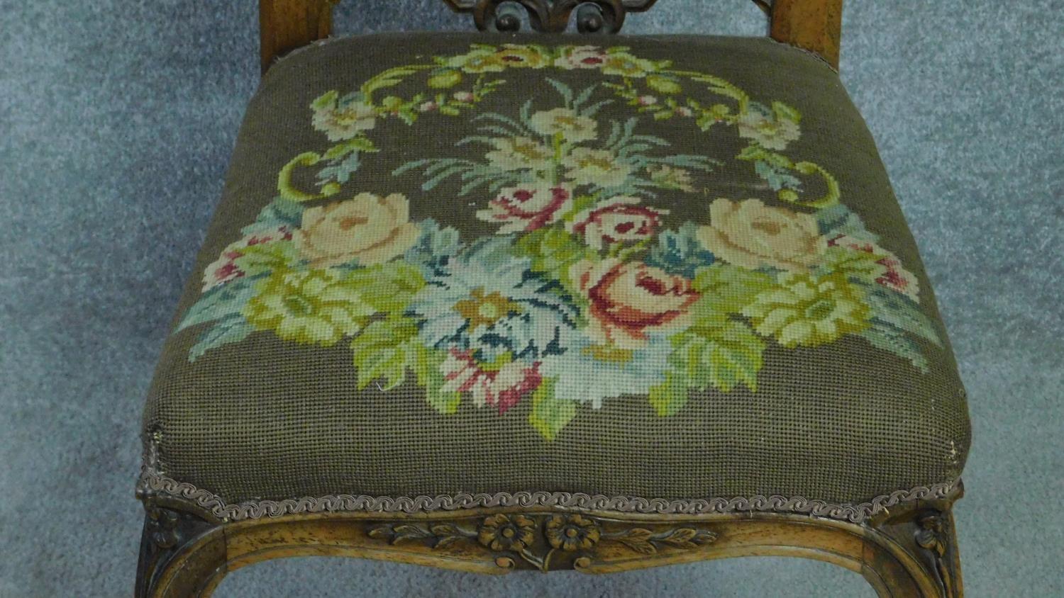 A Victorian rosewood floral carved and upholstered prie dieu chair raised on cabriole legs. H.111cm - Image 4 of 5