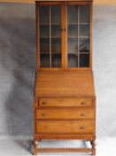 A mid 20th century oak bureau bookcase. H.190 W.80 D.47cm