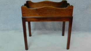 A Georgian style mahogany butler's tray on stand. H.72 W.73 D.49cm