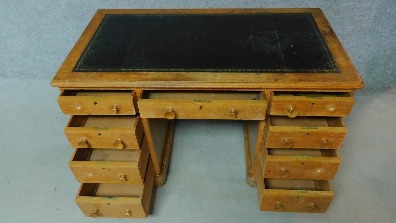 A 19th century oak leather top desk with central long frieze drawer and eight short drawers. H.75 - Image 2 of 8