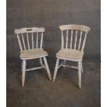 Two 19th century distressed painted pine dining chairs. H.86 x 40cm