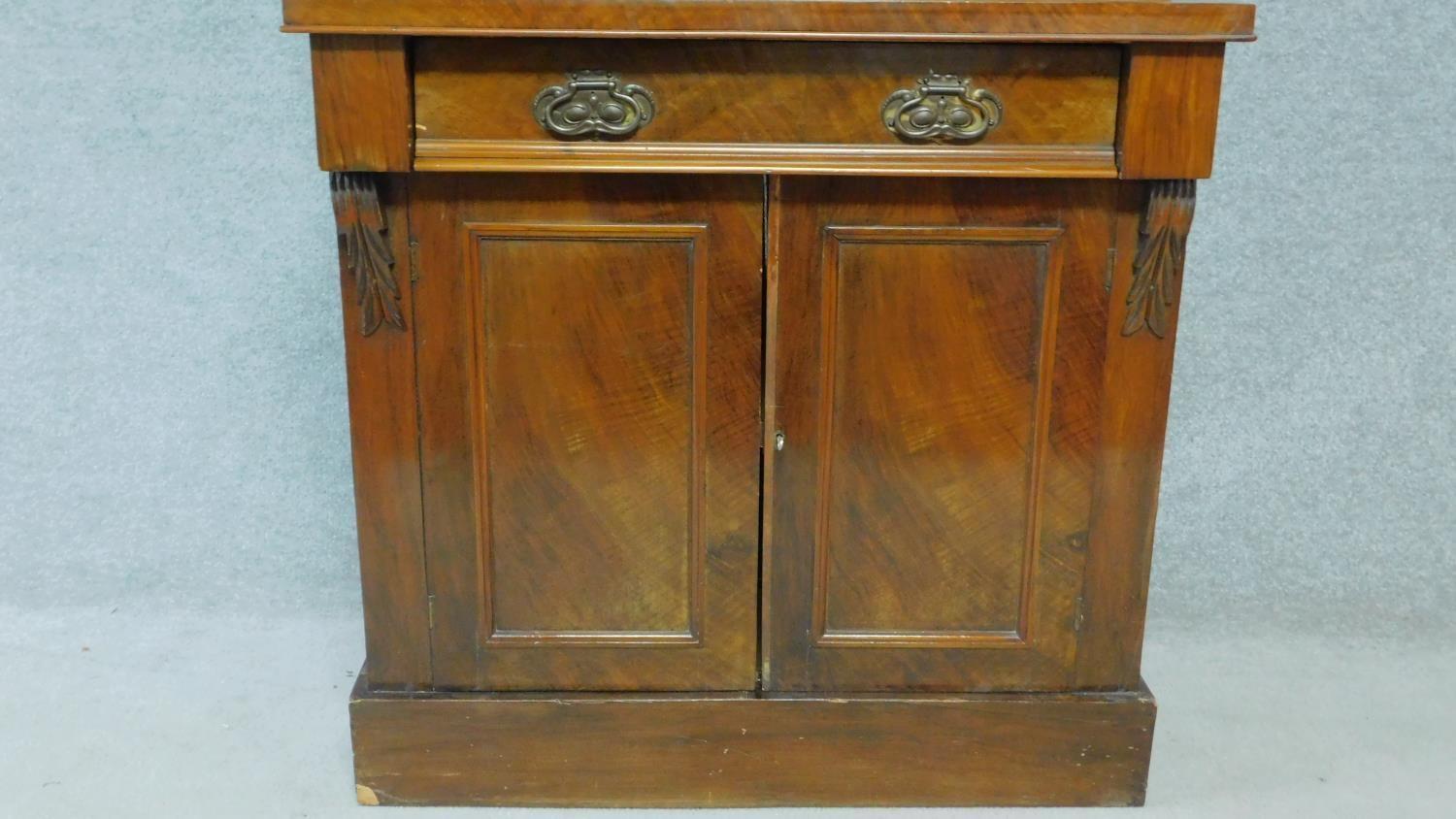 A late 19th century mahogany bookcase with glazed doors above frieze drawer above panel doors - Image 3 of 4