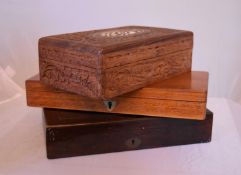 A Regency mahogany and brass inlaid instruments case, another similar and an Indian carved teak