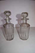 A pair of Georgian cut glass decanters. H.23cm