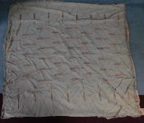 An antique indian silk embroidered bed throw with tassel motifs and silk brocade edging. On the