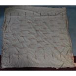 An antique indian silk embroidered bed throw with tassel motifs and silk brocade edging. On the