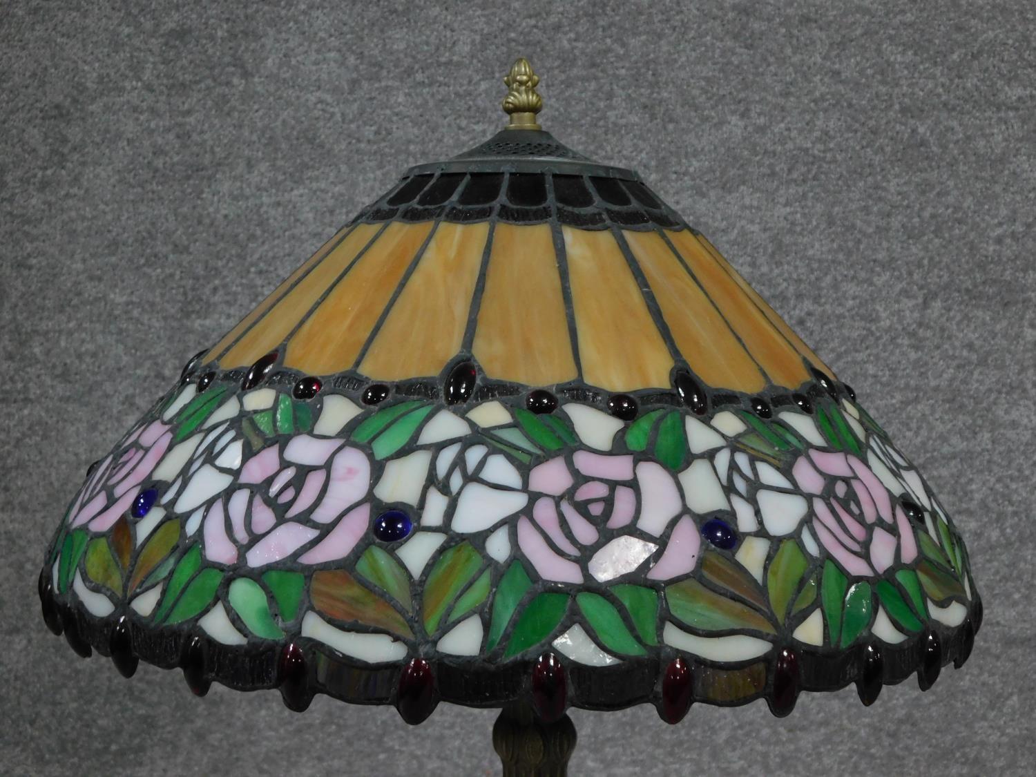 A pair of Tiffany style coloured glass table lamps. Shades have rose and foliate design and the - Image 2 of 3