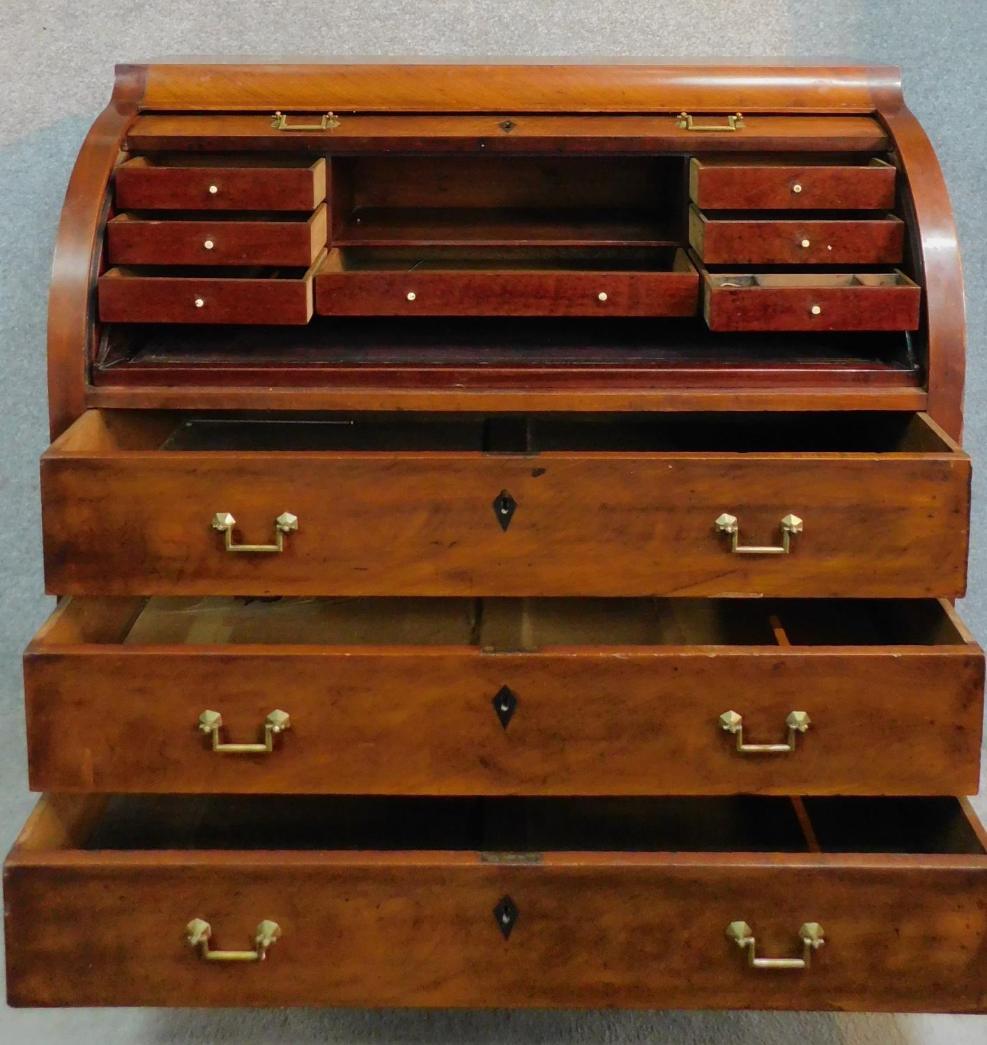 A 19th century continental mahogany cylinder top bureau with tooled leather lined slide out - Image 2 of 7