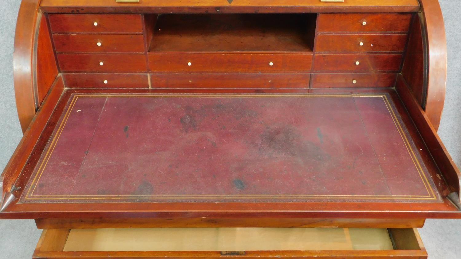 A 19th century continental mahogany cylinder top bureau with tooled leather lined slide out - Image 4 of 7