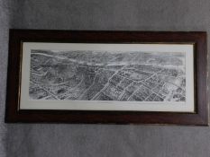 A framed and glazed bird's eye view map of Dublin. H.55 W.115cm