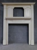 A white painted Adam style fire surround with ribbon and swag decoration. 193x155cm