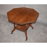 A late Victorian walnut octagonal top occasional table. H.70 x 82cm