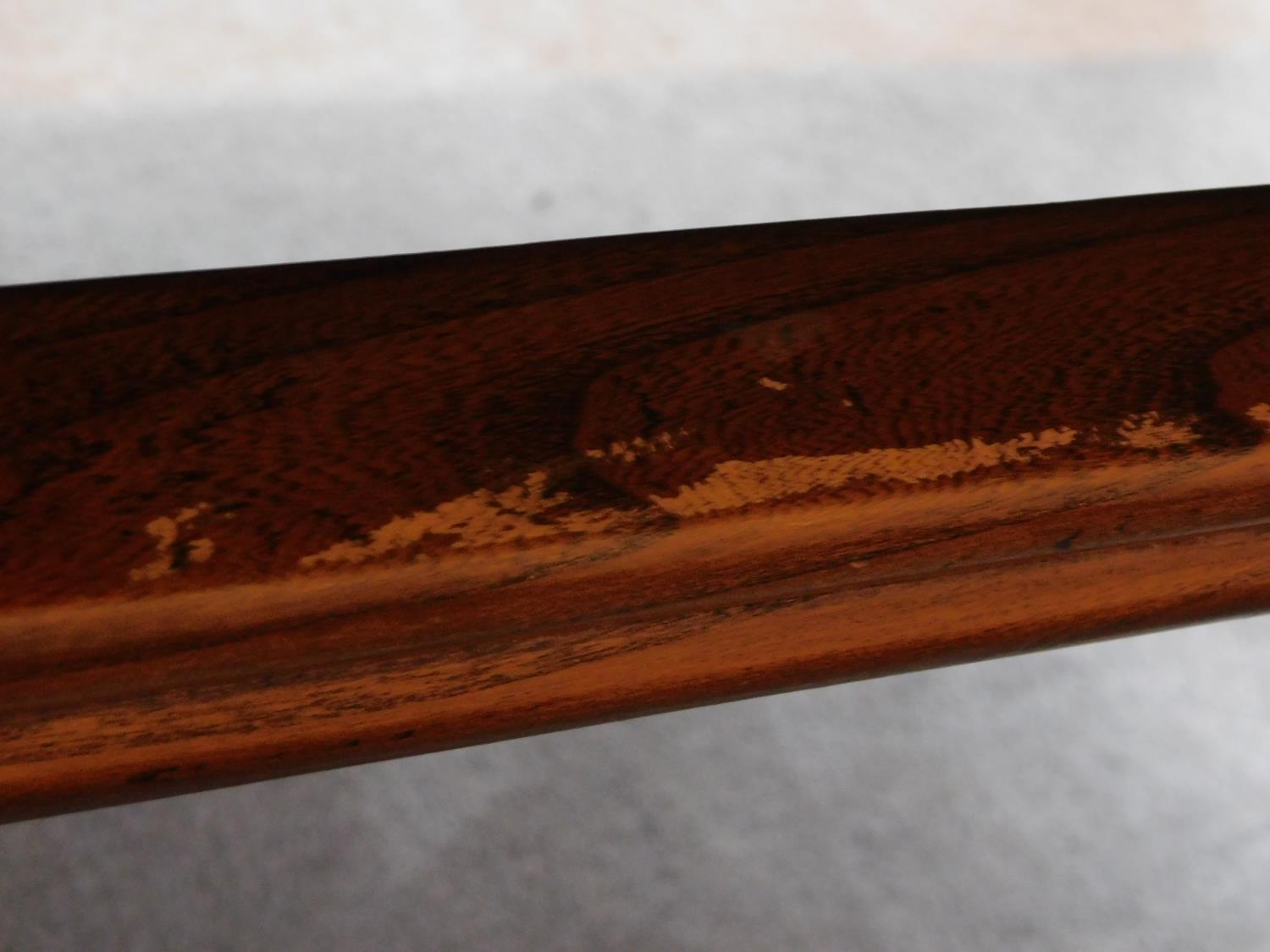 A Chinese hardwood rattan topped dining table raised on circular section supports. Possibly retailed - Image 6 of 7