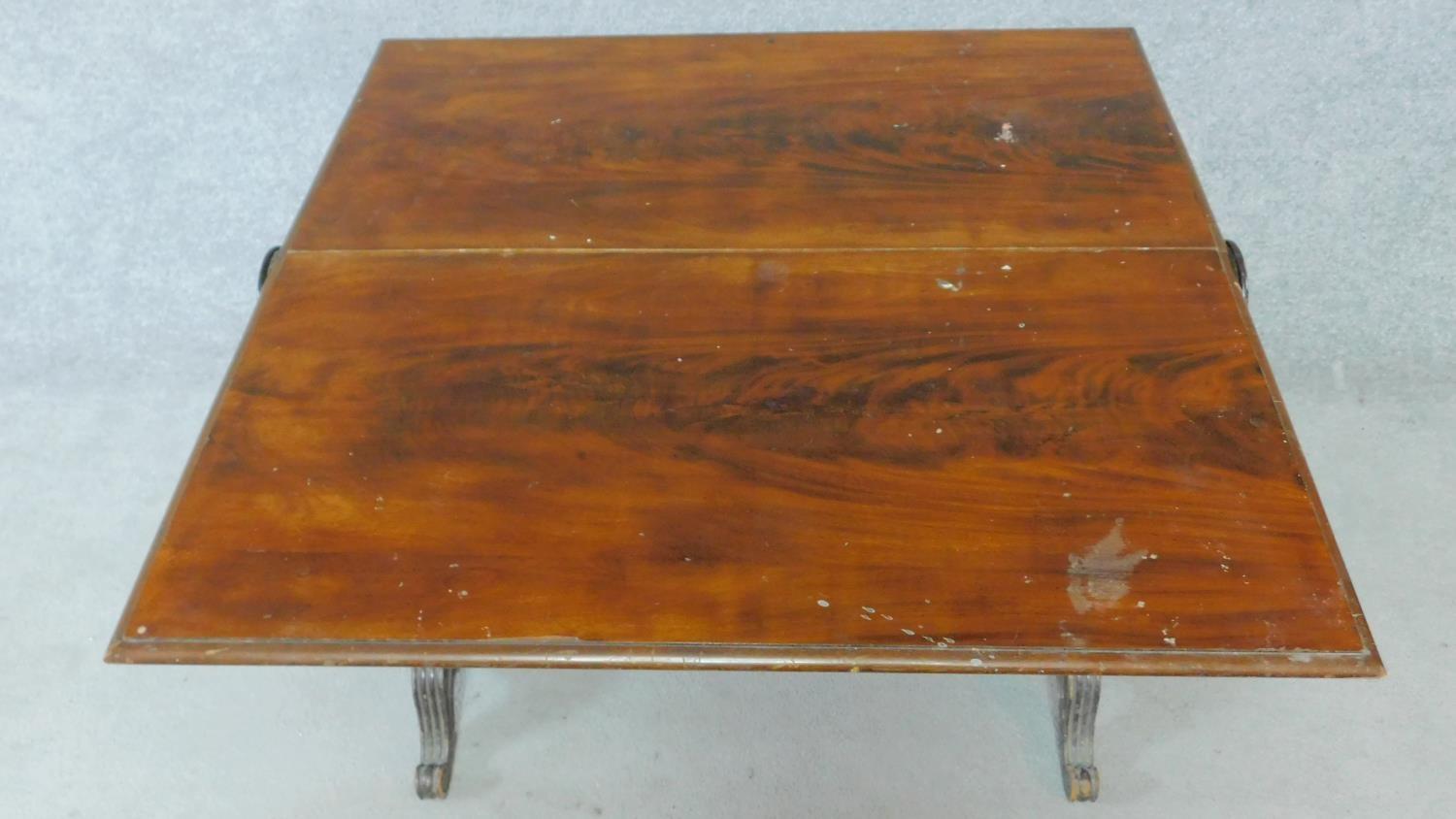 A 19th century Continental flame mahogany drop flap tea table. H.70 W.92 D.91cm - Image 2 of 6