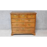 A Georgian mahogany chest of three short over three long graduated drawers on bracket feet. H.92xW.