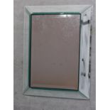 A contemporary mirrored bathroom wall cabinet. H.80 W.60cm