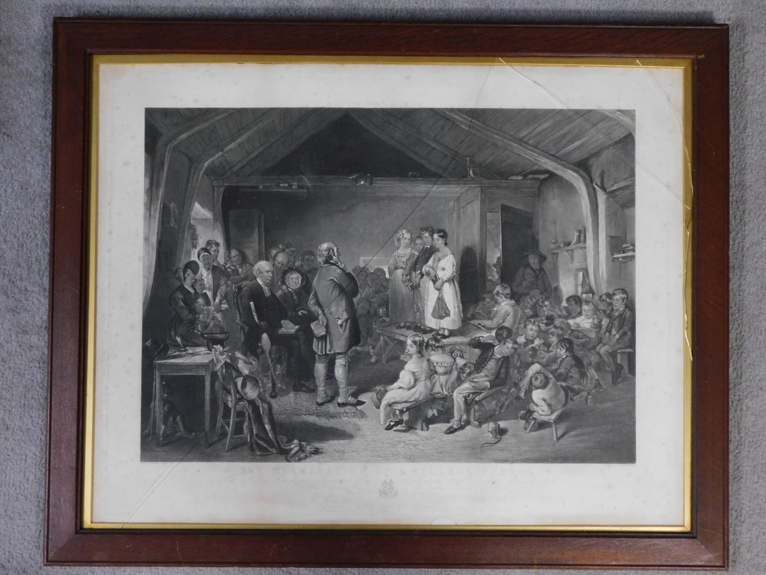 A framed and glazed lithograph titled 'The examination of a village school'. (cracked glass).