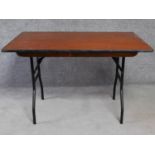 A metal framed folding trestle table. H.76 W.120 D.76cm