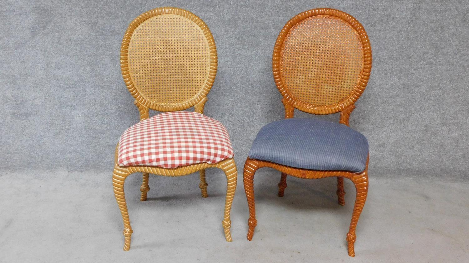 A pair of rope twist rattan backed dining chairs. H.98cm