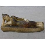 An antique painted, lacquer and gilded alabaster Burmese lying buddah sculpture. H.19 W.45cm