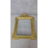 A 19th century French carved giltwood pier mirror with rococo carved shell and foliate cresting. H.