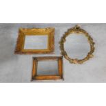 Two antique giltwood mirrors and a gilded plaster mirror. One with an oval shape with carved