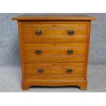 A Victorian satin walnut chest of three drawers on bracket feet. H.83 W.84 D.52cm