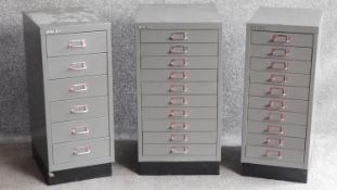 Three contemporary metal filing cabinets of different sizes by Bisley. H.68 W.35 D.48cm (largest).