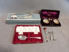 A collection of silver items. Including a pair of George III, 1796, Sugar nips by Thomas Watson in a