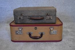 A vintage canvas covered plywood suitcase and another larger vintage suitcase. H.20 x 50cm