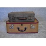 A vintage canvas covered plywood suitcase and another larger vintage suitcase. H.20 x 50cm