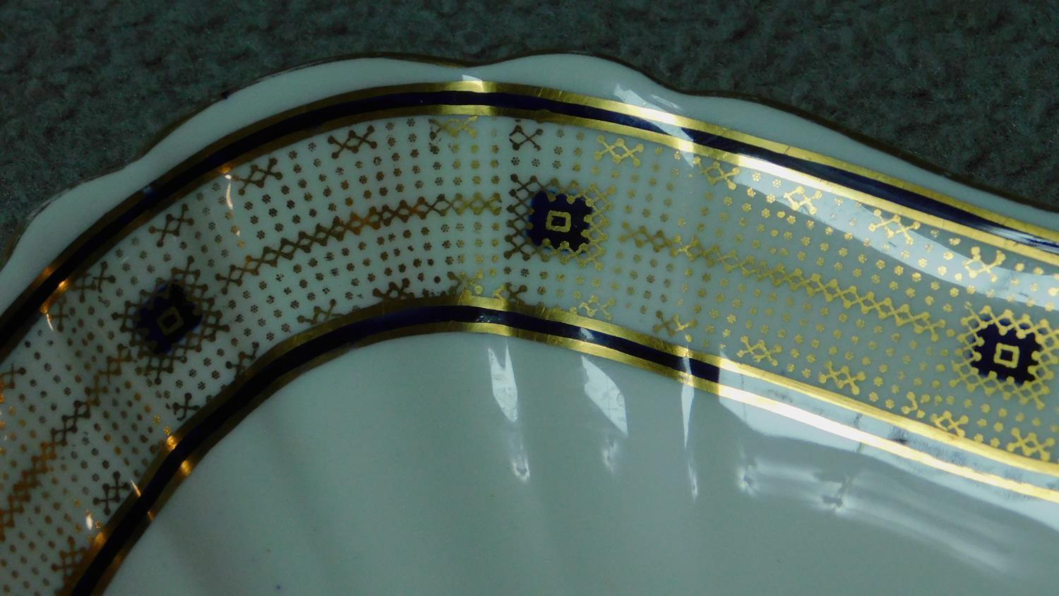 Five antique hand painted bowls by Mappin and Webb Ltd. Gilded and navy blue geometric detailing - Image 3 of 8