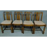 A set of four mid 20th century Art Deco style oak dining chairs. H.86cm