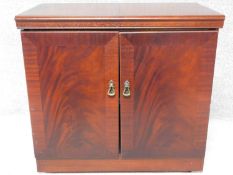 A contemporary faux mahogany metal cased heated buffet cabinet. H.73 W.77 D.44cm