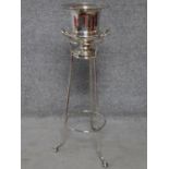 A silver plated campana form wine cooler on stand. H.82cm