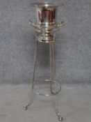 A silver plated campana form wine cooler on stand. H.82cm