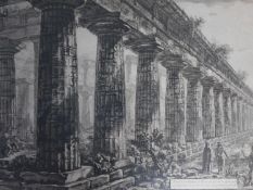 A framed and glazed etching titled 'Temple de Neptune à Pesto', 1778, by Giovanni Battista Piranesi.