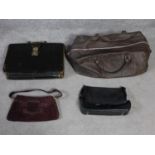 A collection of four vintage leather and suede bags. A large brown leather holdall, a plum suede