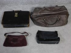 A collection of four vintage leather and suede bags. A large brown leather holdall, a plum suede