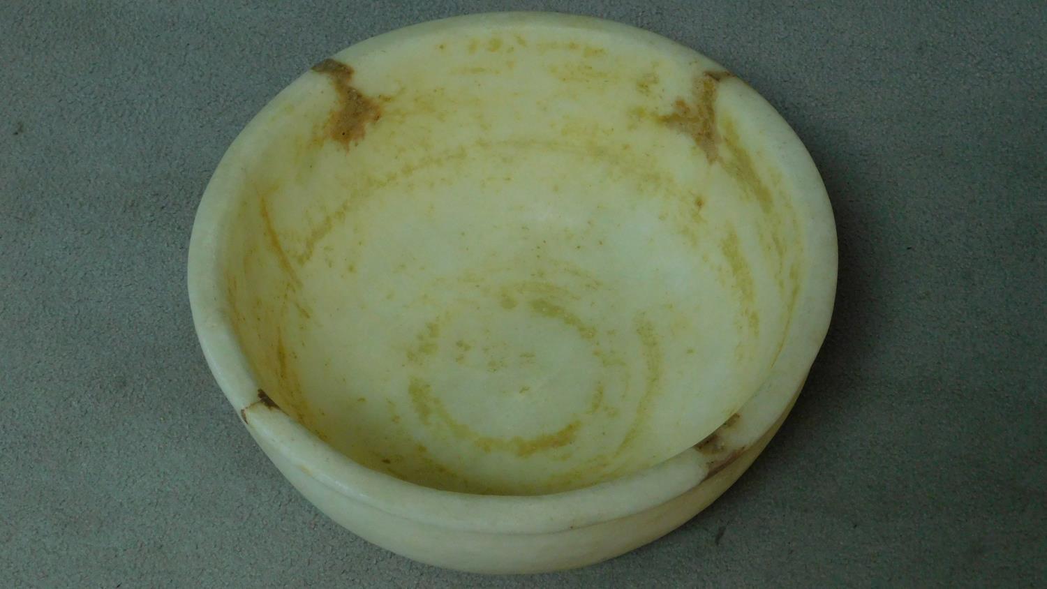 A carved alabaster lipped bowl. H.16 W.45 D.45cm - Image 3 of 3