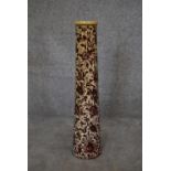 A Persian Isfahan bamboo vase, decorated with stylised flowers. H.70cm