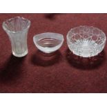 A collection of glassware. Including heavy star and abstract shape cut crystal fruit bowl and